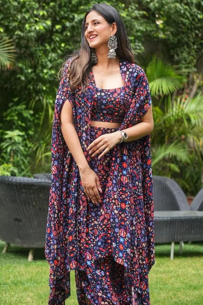 BLUE JAAL PRINT DRAPE SKIRT WITH ARYA BUSTIER AND CAPE