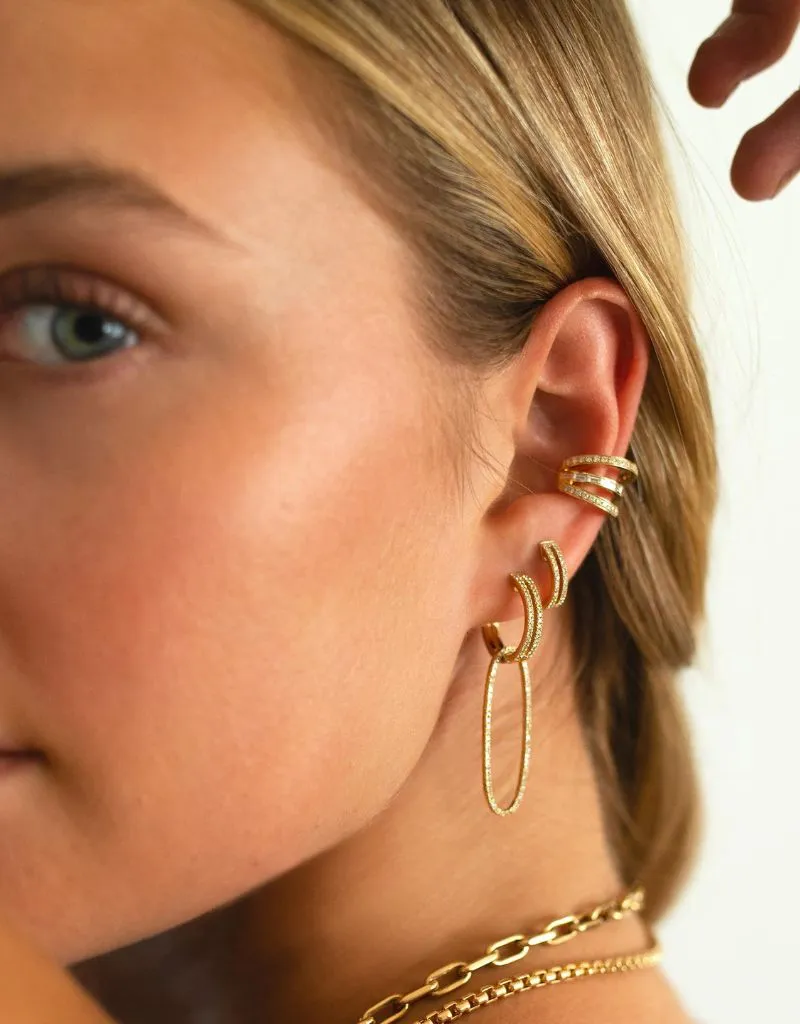 Bridget King Open Bar Diamond Huggies in Yellow Gold