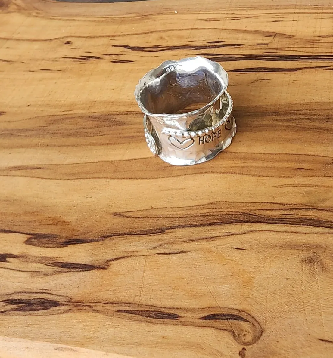 Hope Spinner Ring | Handcrafted .925 Sterling Silver Hammered Bypass Ring with Hearts & Arrow