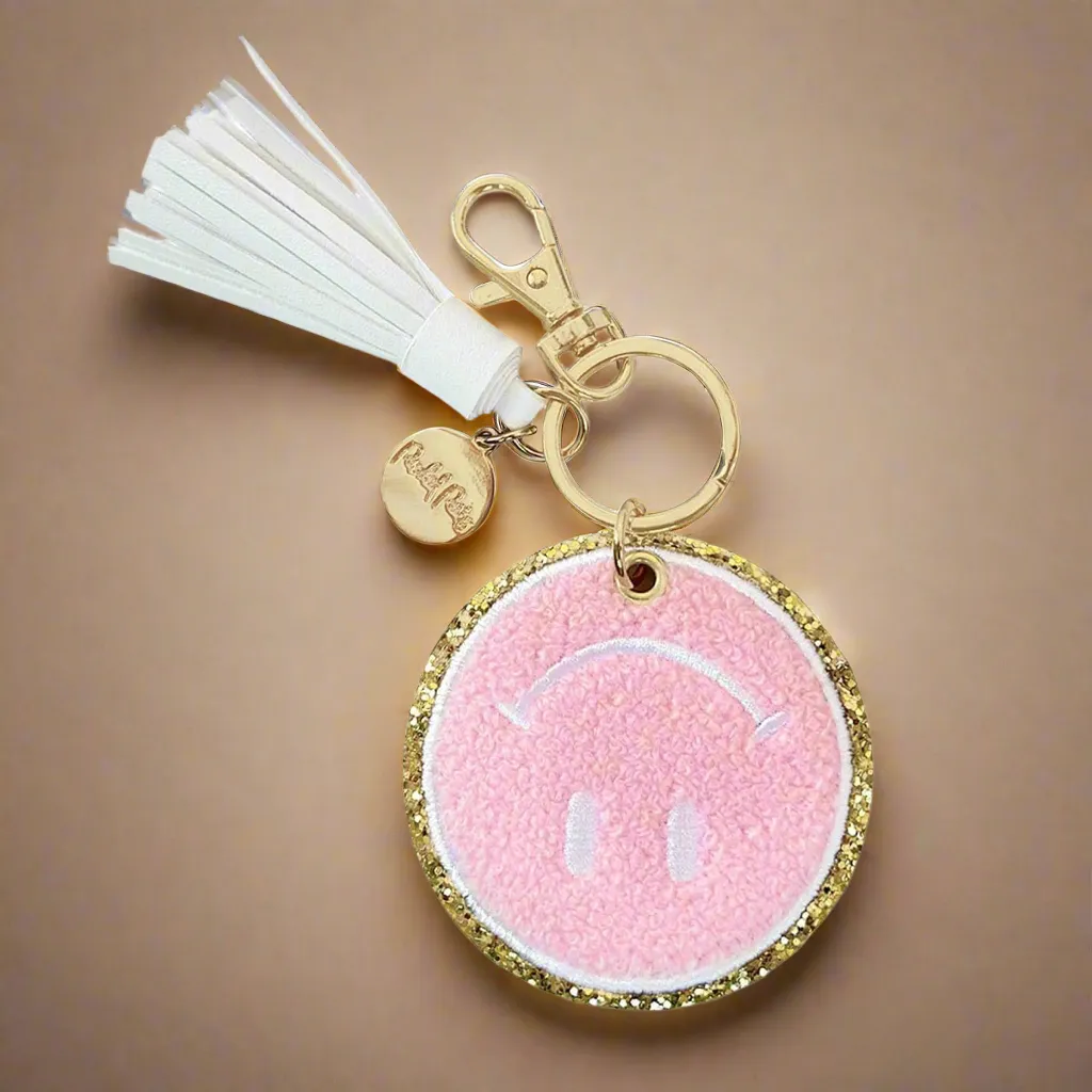 Packed Party Keep Cozy Smiley Keychain